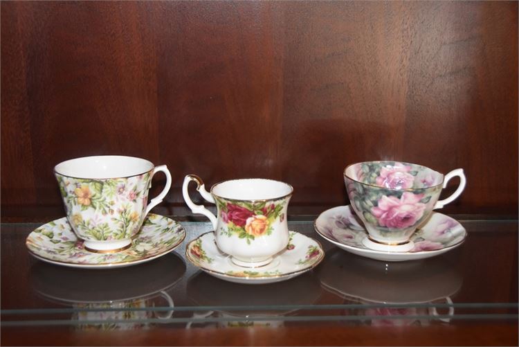 Three (3) Floral Pattern Tea Cups With Saucers