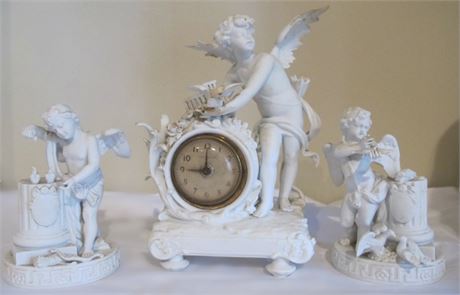 Figural Mantle Garniture Consisting of 3 Pieces of Bisque Porcelain