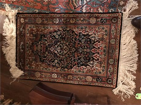 Small finally woman Persian mat
