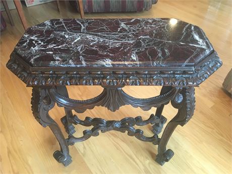 Marble-topped, carved wood side table