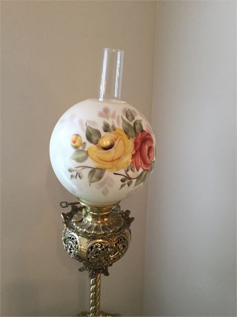 Brass floor lamp with painted glass globe