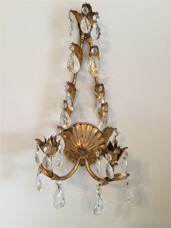 Pair of gold colored wall sconces