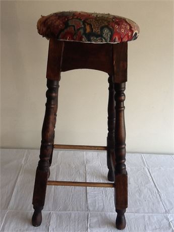 Wooden stool with fabric top