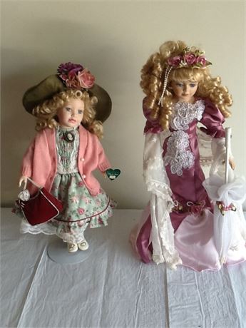 Pair of dolls on stands