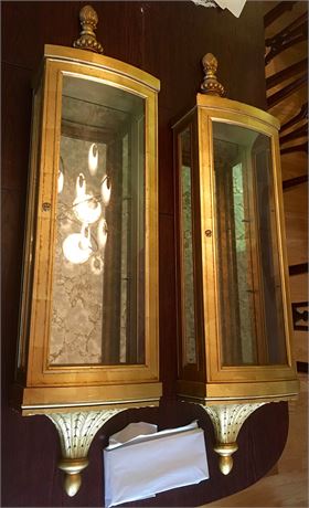 Pair of Hanging, Mirrored Curved Glass Display Cases with Gilt Leaf Motif