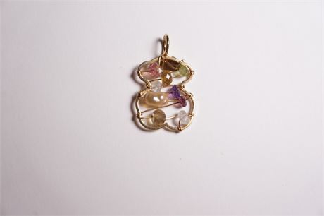 Lot 134: Tous 18k Gold Multi Color Gemstone Bear Pendant