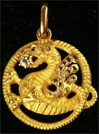 Lot 305. Gold Diamond and Ruby Dragon Pendant