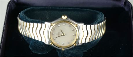 Lot 303. Ebel 18 Karat Wave Steel And Gold Ladies Wristwatch