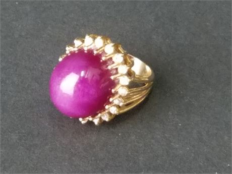 Lot 79. 14K Yellow Gold Ring with Purple Cabochon Stone and Diamonds