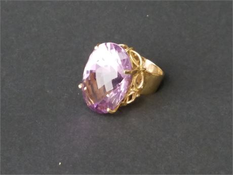 Lot 72. 14K Yellow Gold and Oval Cut Amethyst Ring