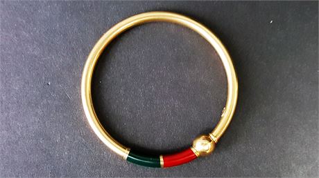 Lot 326. Gold Metal and Enamel Bangled Bracelet