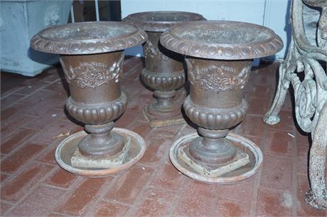 Lot 434. Trio of Cast Iron Planters