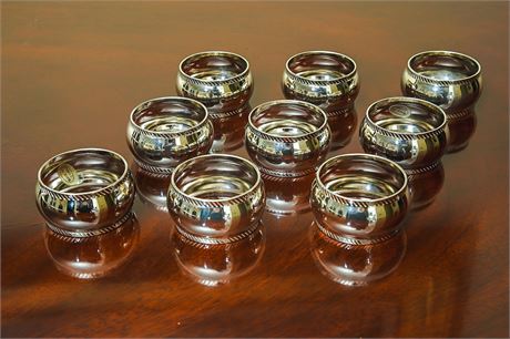 Set of Nine Silver Tone Napkin Rings