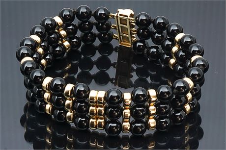 Black Onyx and 14 Karat Yellow Gold Bead Bracelet