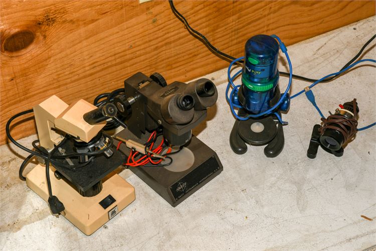 Four Microscopes