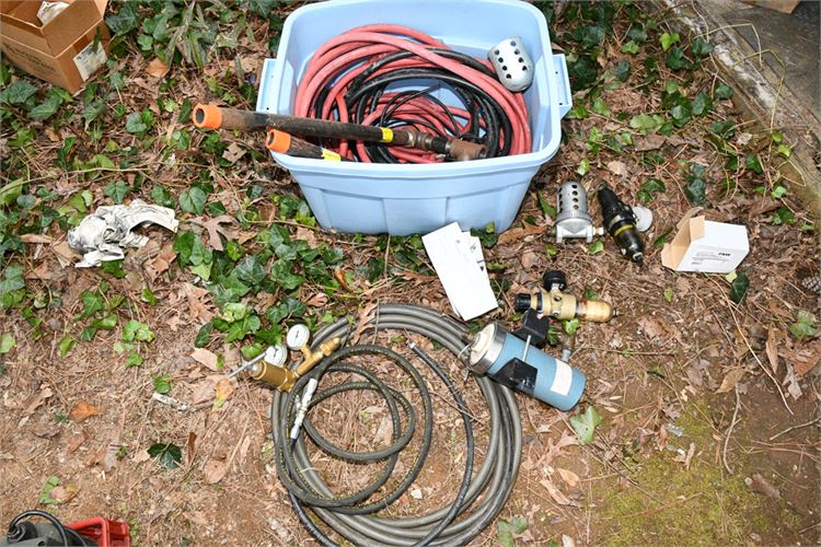 Bin Containing Welding Hoses Gauges and Other Items