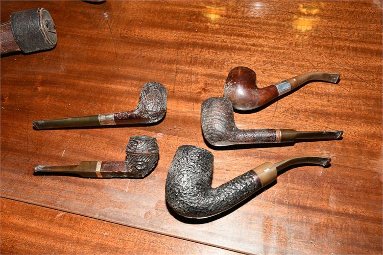 Five vintage pipes