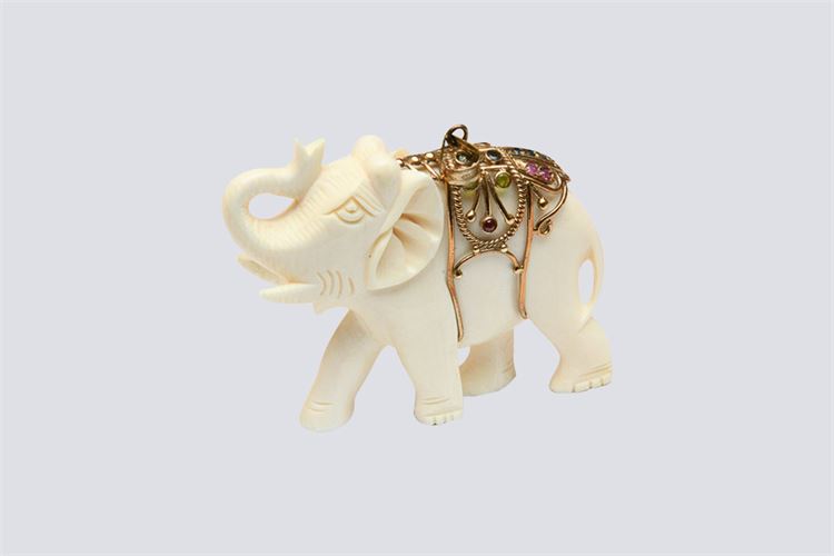 Carved Elephant Figure with Gold Mounts.