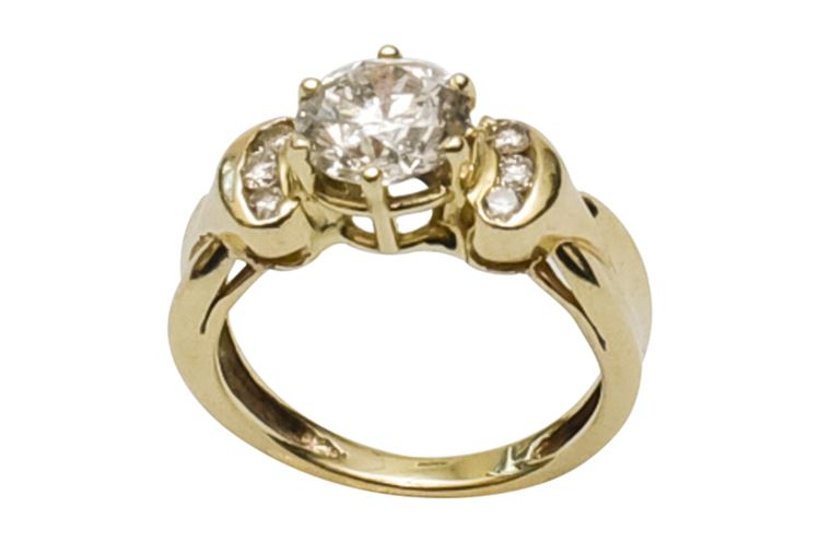 14K Yellow Gold Ring Containing One Round Brilliant Cut Natural Diamond