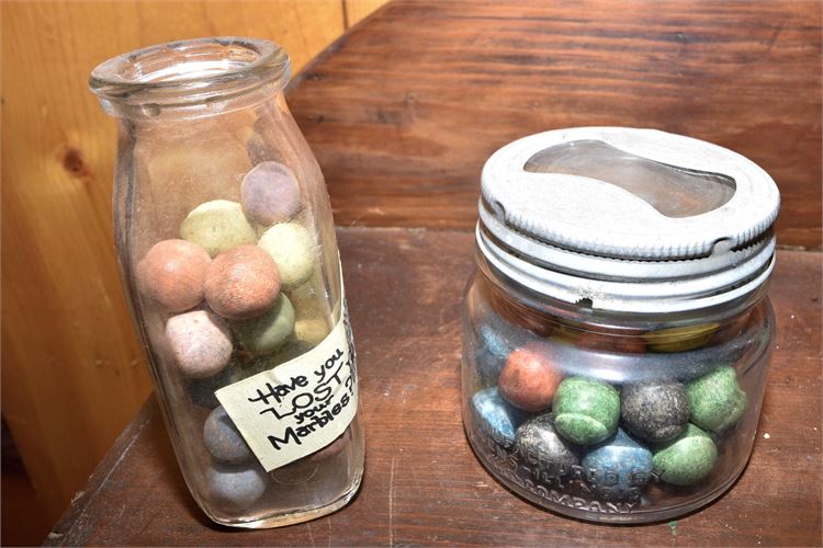 Two Jars Containing Antique Porcelain Marbles