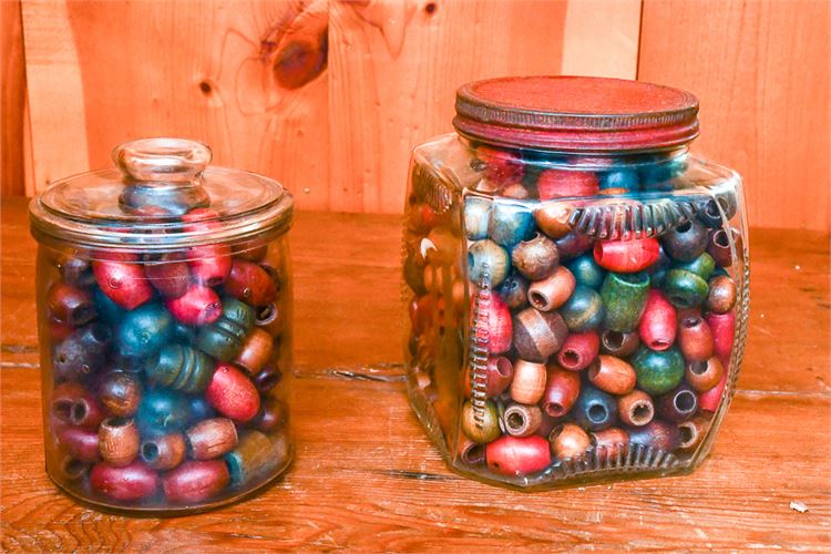 Two Jars Containing Wooden Beads