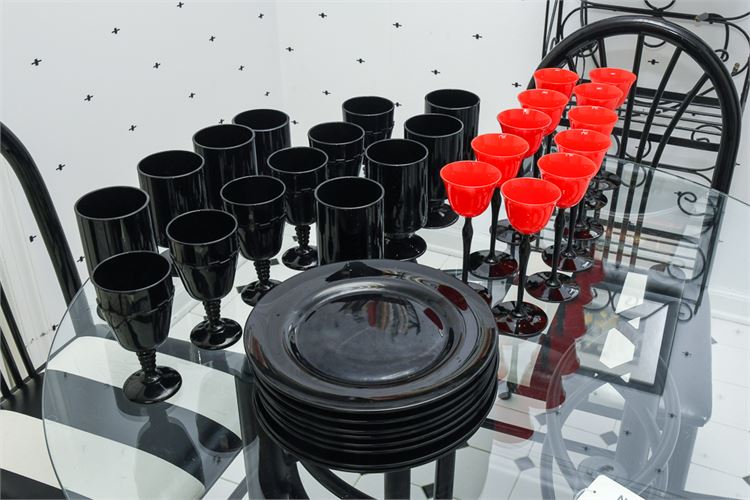 Black Glass Plates and Red and Black  Stemware