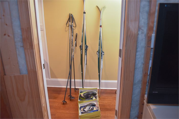 Two (2) Sets Of Fisher Skis and Ski Boots