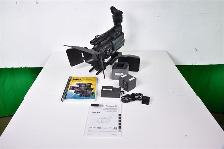 Panasonic AF 150 hi def video camera w/rail system w/viewfinder hood and books R