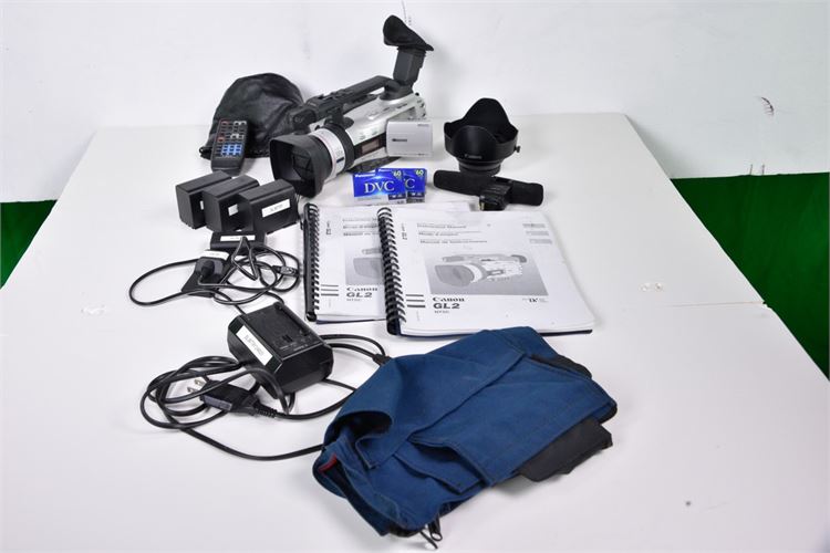 Cannon GL2 video camera w/book and many extras