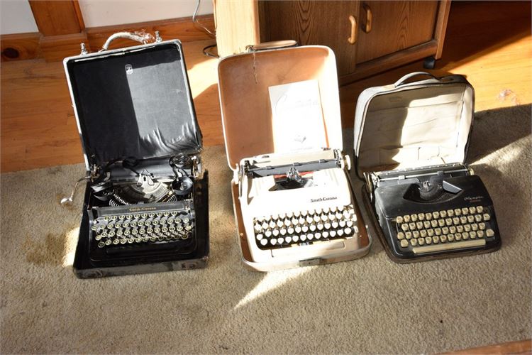 Three (3) Vintage Cased Typewriters with Cases