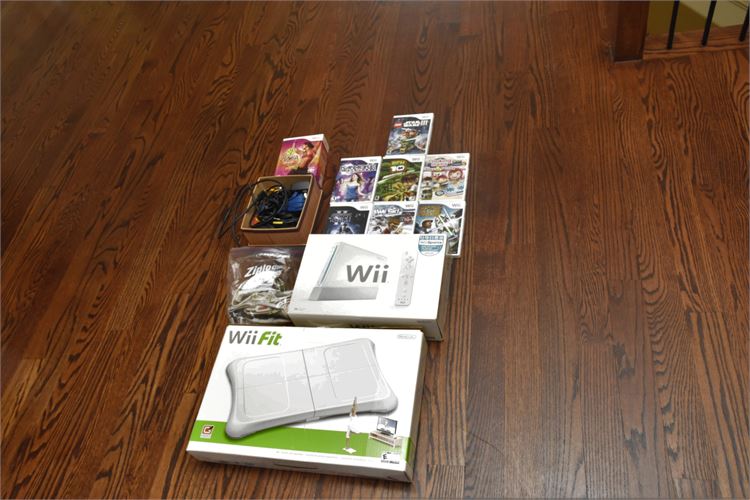 NINTINDO WII Gaming Bundle (Console Wii Pad and Games)