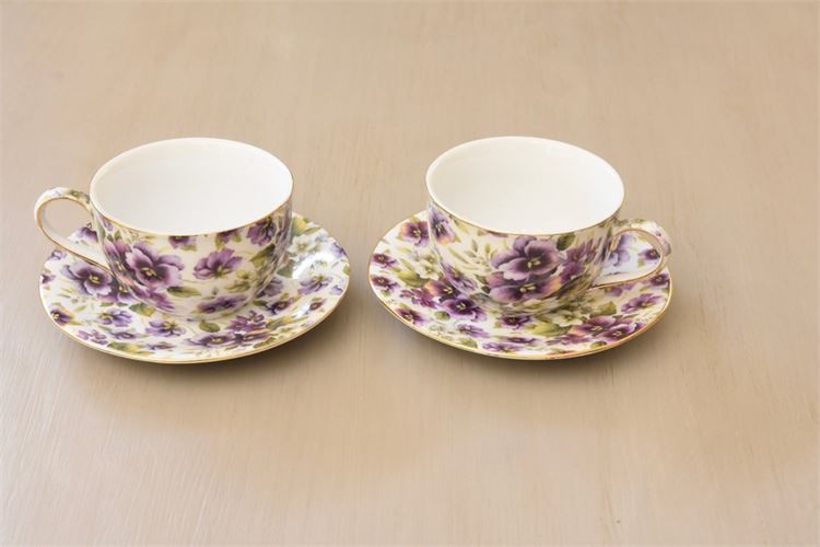 Two Floral Pattern tea Cups With Saucers By BAUM BROS.