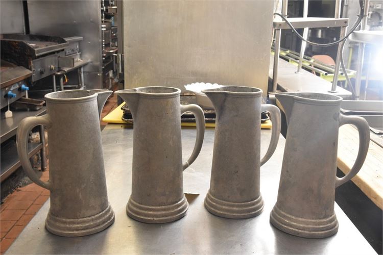 Four Metal Pitchers