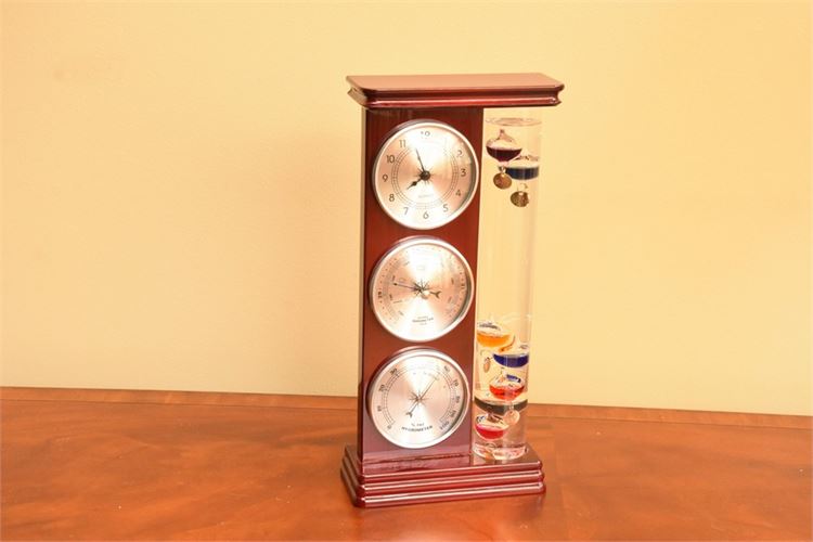 Three Weather Gauges Mounted In Wood