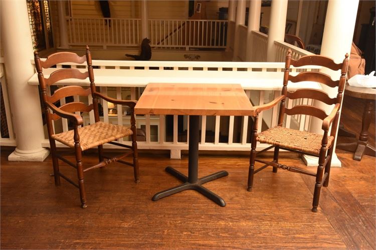 Table and Two Ladder Back Chairs