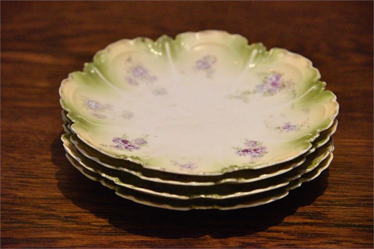 Four (4) Floral Pattern Porcelain Plates
