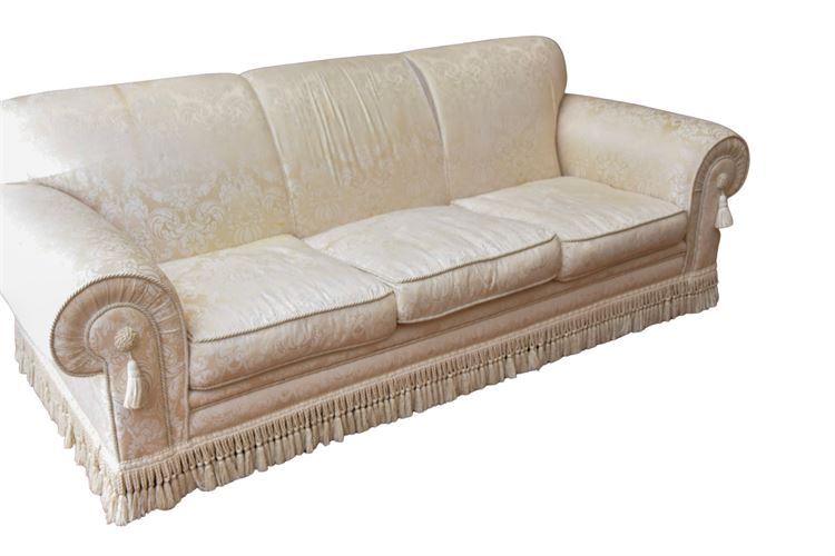 Rolled Arm Patterned Sofa With Fringe Detail