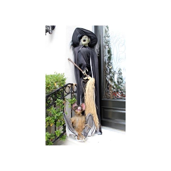 Life-Size Witch Prop with Lighted Eyes and Bat