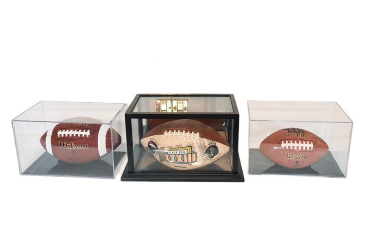 Three (3) Collectable Footballs W/ Display Cases