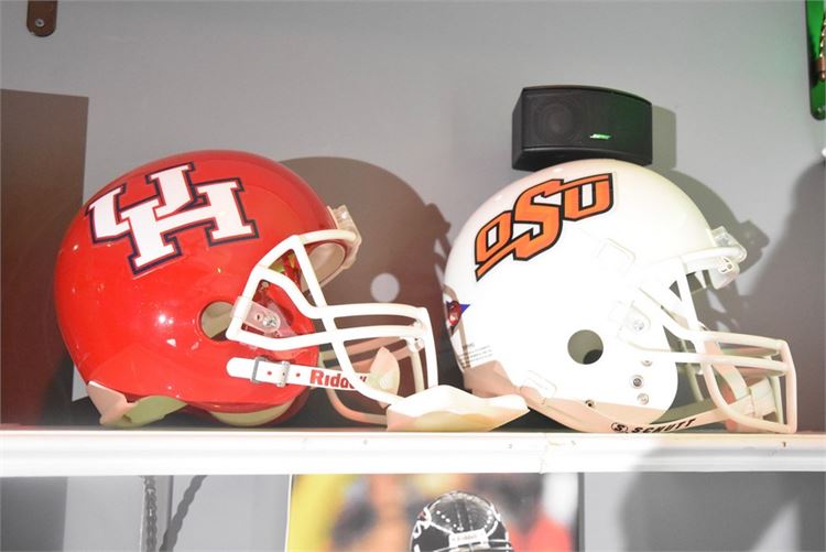 Two (2) College Football Helmets