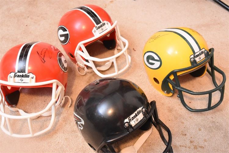 Group Football Helmets Two Autographed