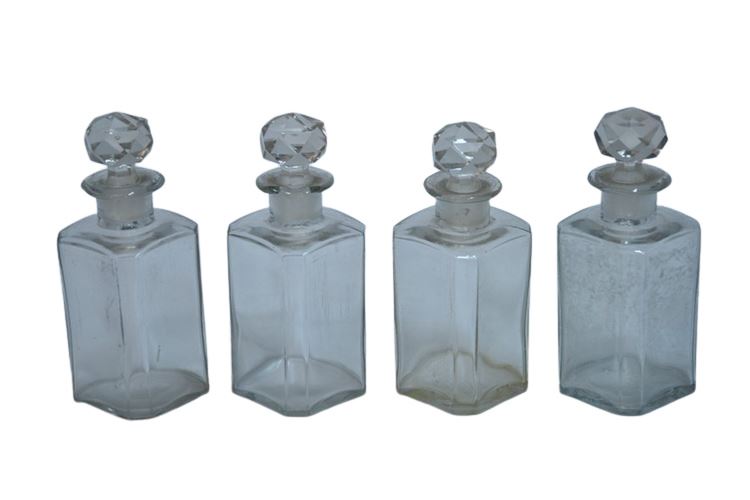 Set Four (4) Vintage Glass Bottles