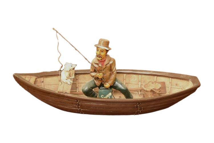 Decorative Figure Of Fisherman In A Boat