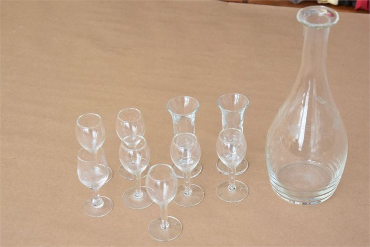 Assortment of glassware with small glass carafe