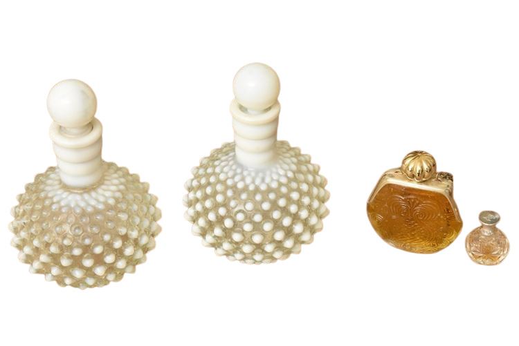 Four perfume bottles (see description)