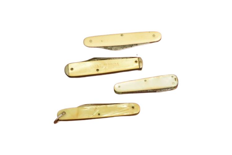 Four (4) Pocket Knives