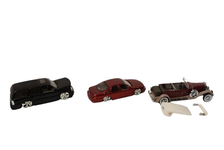 Three (3) Model Cars