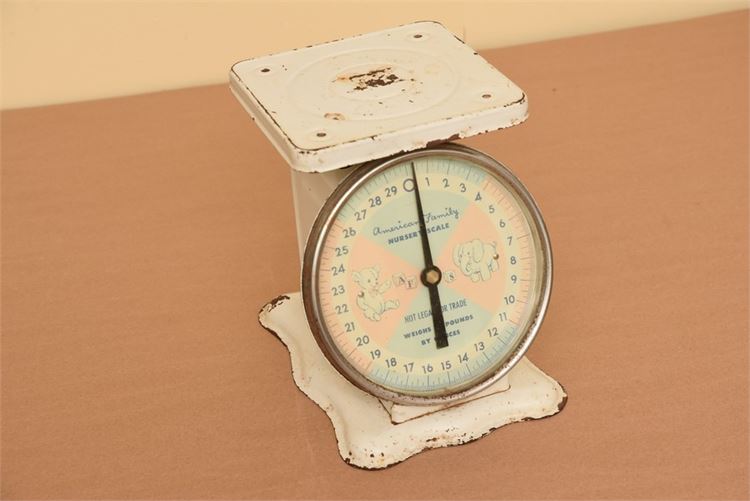 Antique white metal baby scale