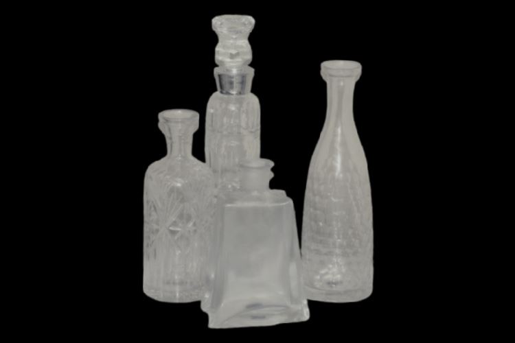 Four (4) Glass Decanters