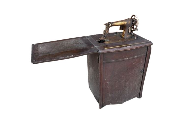 Antique Sewing Machine With Cabinet